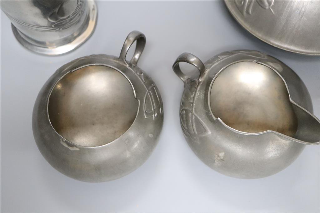 A Libertys Tudric four piece pewter tea set, shape no.0231 - the jug shape no.0281, 19cm